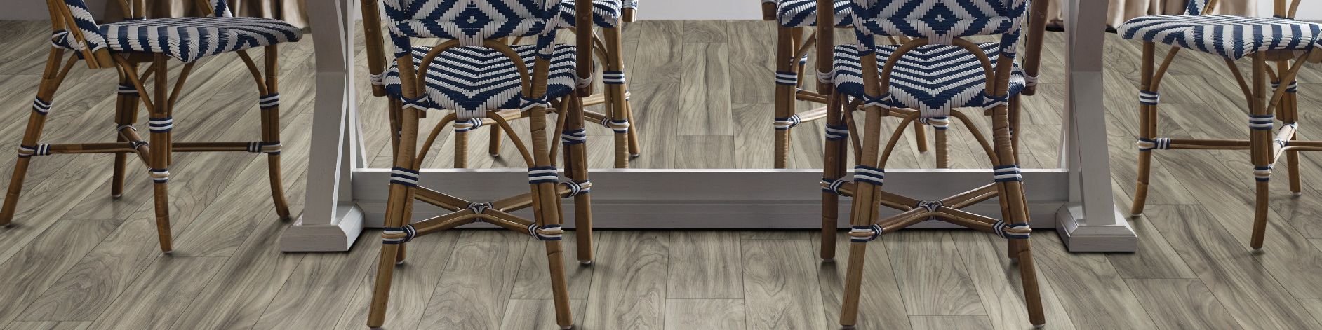 woven dining chairs around a dining table - Young's Interiors & Flooring in Ford City